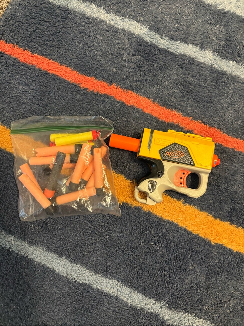 Nerf Compact Yellow and Orange Single-Shot Pistol with Foam Darts